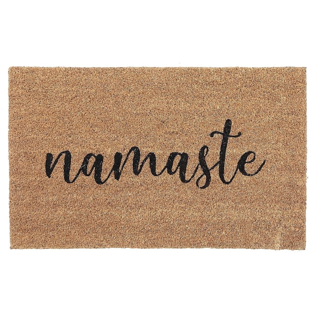 Rectangular coir door mat featuring the word 'namaste' in black cursive text, ideal for welcoming guests.