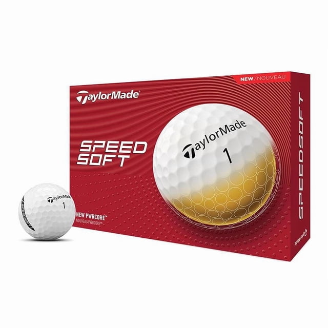TaylorMade SpeedSoft Golf Ball - One Dozen, white dimpled golf balls with black TaylorMade logo and number 1, displayed next to red packaging box featuring large golf ball graphic and SpeedSoft branding, engineered for ultra-low compression, soft feel, fast ball speed, and long iron distance, also suitable for practice sessions to improve control.