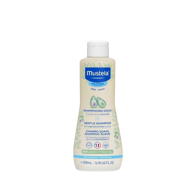 Mustela Gentle Shampoo Gentle Baby Shampoo 500 ml bottle with a beige label featuring green avocado illustrations and blue Mustela branding. Designed for babies, this shampoo offers a mild cleansing experience for delicate scalps, maintaining the natural balance of hair and scalp. The 500 ml size is ideal for regular use, leaving hair soft, shiny, and manageable.