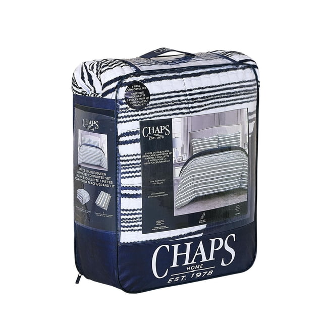 Chaps 3 Piece Comforter Set packaged in a navy blue and white zippered bag featuring a chambray striped pattern. This double/queen bedding set includes one comforter and two matching shams designed to refresh bedroom décor with soft, textured fabric.