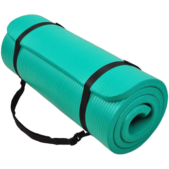 The BalanceFrom GoCloud 71x24 Inches Extra Thick Yoga Mat in green, featuring 1-inch high-density foam for superior cushioning and joint support. The rolled-up mat is secured with black carrying straps, showcasing its lightweight and portable design. The textured surface provides a double-sided non-slip grip, ideal for yoga, Pilates, and other floor exercises. Measuring 71 inches long and 24 inches wide, it offers ample space for all body types. Moisture-resistant material ensures easy cleaning and maintenance.