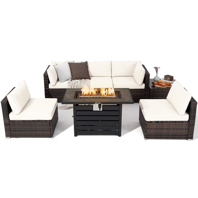 Gymax 7PCS Patio Rattan Furniture Set with mix brown PE rattan and off-white cushions. Features a CSA-certified 42-inch fire pit table with adjustable flame, 50,000 BTU heat output, and high-temp resistant tabletop. Includes modular corner and armless sofas, a tempered glass coffee table, and a waterproof cover. Durable steel frame ensures stability, ideal for outdoor patio conversation setups.
