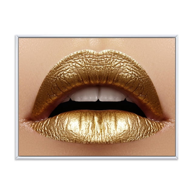 Designart Close Up of Female Plump Lips With Golden Lipstick FLOAT FRAME WALL ART showing a centered close-up of plump female lips coated in metallic gold lipstick on smooth skin, printed on premium cotton canvas with gallery wrap and white floating frame, ready to hang wall décor suitable for modern interiors.
