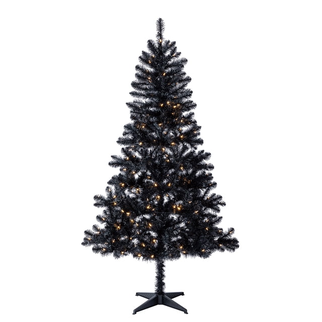 Holiday Time Madison™ 6.5' black pre-lit full pine Christmas tree with warm white lights on a stable stand.