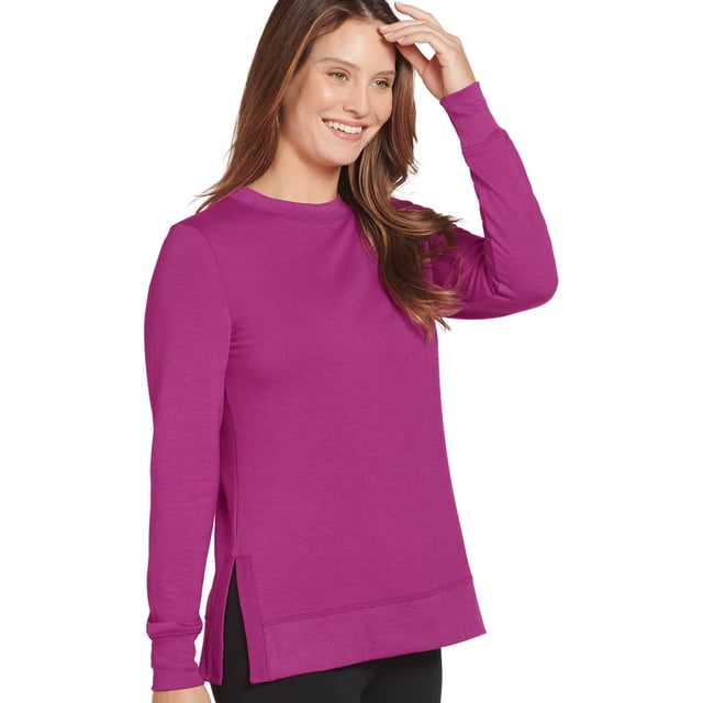 Jockey French Terry Sweatshirt in a vibrant magenta colour, featuring a relaxed fit with rib-knit details, a hi-lo hem, and side slits. Made from a soft blend of polyester, rayon, and spandex, this lightweight and versatile sweatshirt is styled with long sleeves and a crew neckline. Suitable for pairing with leggings, joggers, or jeans for casual or lounge wear.