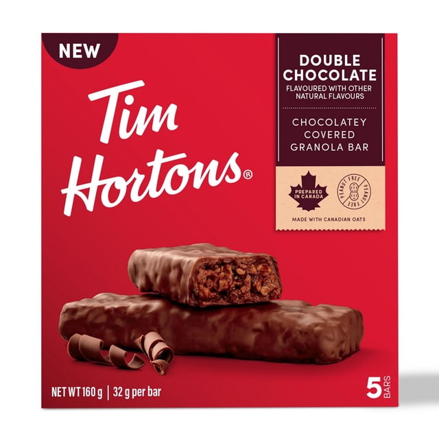 TIM HORTONS GRANOLA BAR DOUBLE CHOCOLATE showing a chocolate-covered granola bar with visible oats and chocolate pieces, on a red background with the Tim Hortons logo and product details including peanut-free, prepared in Canada, and made with Canadian oats, containing 5 bars of 32 g each, suitable for school lunches or snacks.
