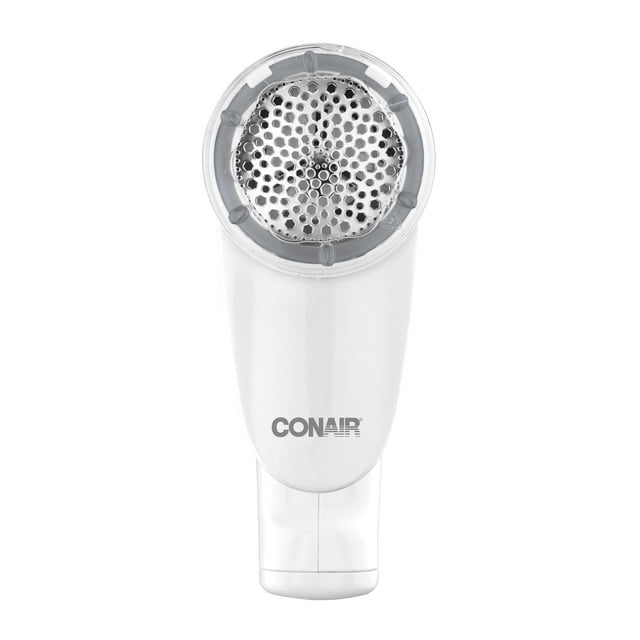 Conair Extreme Fabric Defuzzer with a white body and a large 4.5 cm circular metal shaving surface featuring hexagonal holes, shown front-facing, designed to quickly remove lint, fuzz, and pilling from various fabric types with an easy-grip handle and detachable lint collector.