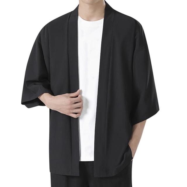 Men's solid drop shoulder kimono jacket with an open front cardigan design, featuring 3/4 length sleeves and a loose fit. The black cardigan sweater is styled over a white shirt and paired with black pants, suitable for casual or formal occasions.
