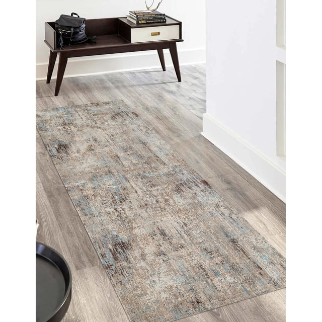 ECARPET Malia Traditional Runner Rug with muted blue, beige, and brown Turkish-inspired patterns on synthetic fibers, placed on light wood flooring in a hallway with a dark wood mid-century modern bench featuring a white drawer and books, ideal for high-traffic living spaces.