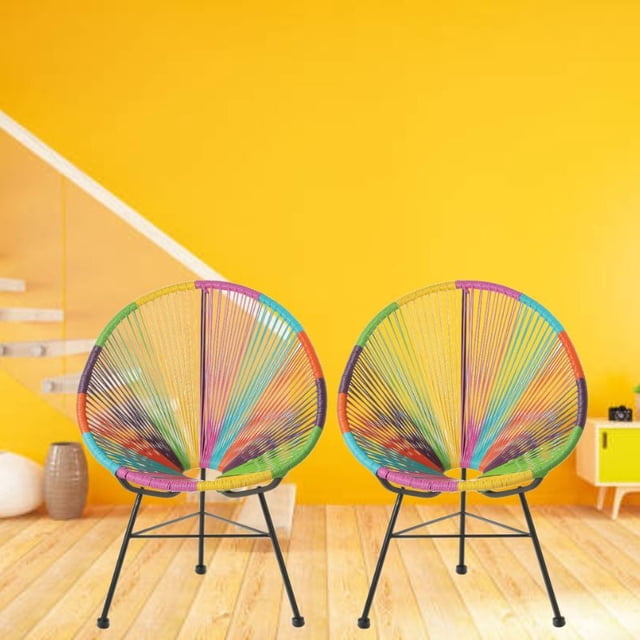 Costa Lounge Chair set of 2 with multicolour plastic wire seats in Acapulco style, oval shape, and black metal legs, shown indoors against a yellow wall and wooden floor, ideal for indoor or patio use with weather-resistant construction.