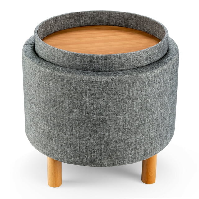 Gymax Rangement Rond Ottoman avec Dessus de Plateau en Tissu Gris, Doté d'Un Siège Rembourré et de Pattes en Bois de Pin Massif. le Ottoman Comprend un Couvercle Amovible Double Face avec un Plateau de Service en Bois d'Un Côté et un Siège Rembourré de l'Autre Côté. Il Offre un Espace de Rangement Dissimulé pour des Articles comme des Couvertures, des Jouets Ou des magazines. la Conception Compacte Mesure 17 Pouces de Diamètre et 16,5 Pouces de Hauteur, le Rendant Adapté pour une Utilisation comme Repose-Pieds, Sièges Supplémentaires Ou une table à Café. les Patins Antidérapants Assurent la Stabilité sur