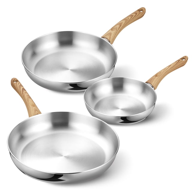 Koch Systeme CS 8+10+12 Inch Stainless Steel Frying Pan Set with Bakelite Handle. The set includes three frying pans of different sizes, each featuring a polished stainless steel finish and ergonomic Bakelite handles with a wood-like texture. Designed for fast and even heating with an aluminum core, these pans are compatible with all stovetops, including gas, electric, and induction. Dishwasher safe for effortless cleaning and oven safe up to 450℉.
