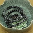 thumbnail image 5 of Bracelet Extensible en Perles Rondes de 8 mm avec Flocon de Neige Naturel et Obsidienne 7 Pouces, 5 of 5