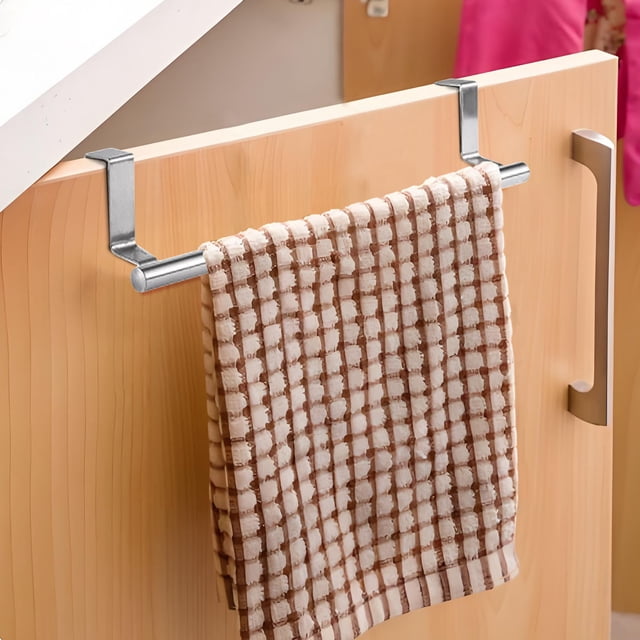 Tyidzon stainless steel towel rack for kitchen and bathroom, shown hanging on a cabinet door. This space-saving, double-layer towel rack features a ventilated design for faster drying and is made of rust-proof stainless steel. Its modern appearance complements various decor styles. A checkered towel is draped over the bar, highlighting its functionality as a cabinet door towel rack.