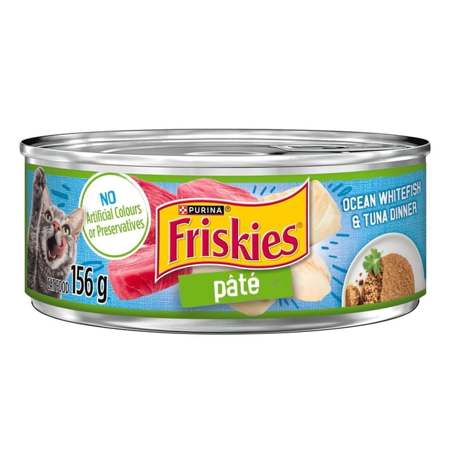 Friskies Pate Whitefish & Tuna Dinner wet cat food 156g can with Purina branding, featuring images of ocean whitefish and tuna on a blue label, a cat illustration, and text highlighting no artificial colours or preservatives for balanced adult cat nutrition.