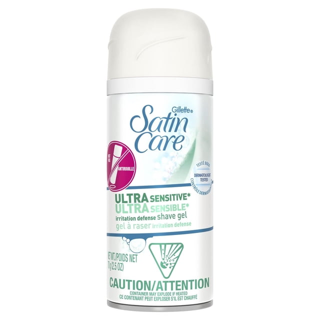 Gillette Satin Care Ultra Sensitive Women's Shave Gel in a white rust-free can with blue and green text, dermatologist tested for sensitive skin, free of dyes and fragrances, providing irritation defense and smooth razor glide, suitable for travel size shave needs.