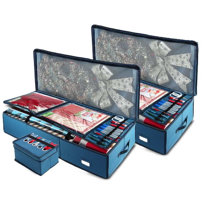 Hearth & Harbor Pack of 2 Wrapping Paper Storage Organizer Containers designed for Christmas wrapping paper rolls and holiday accessories. Each organizer is made of durable 600D Oxford fabric in a blue finish, featuring a spacious under-bed storage design with dimensions of 14” x 40” x 7”. The containers include clear center flap pockets for accessories, a ribbon box for organizing ribbons, and an extra top pocket for gift bags or larger materials. The waterproof and tear-resistant material ensures protection against dust and moisture. The image shows two open organizers with neatly arranged wrapping paper rolls, ribbons, scissors, and holiday decorations.