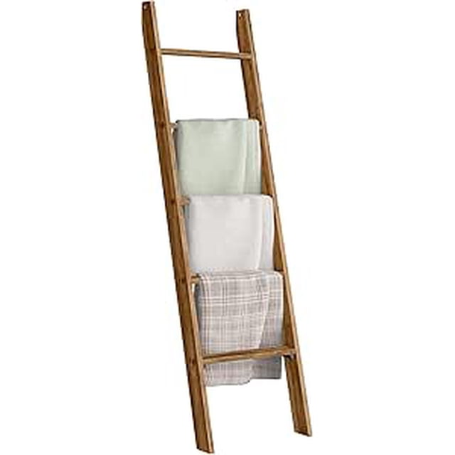 VASAGLE Blanket Ladder Decorative Farmhouse for The Living Room, 5-Tier Ladder Shelf, Ladder Rack for Storage and Decor, Honey Brown — front-facing 5-rung leaning ladder in honey-brown particleboard (17.2"W x 63"H / 43.6 x 160 cm) showing particleboard texture, beveled top and felt pads on legs; five deep rungs for displaying blankets, towels or small decor and toiletries, suits farmhouse decor; note: attach included anti-tip kit. Often used as a compact display shelf for cosmetics or folded throws.
