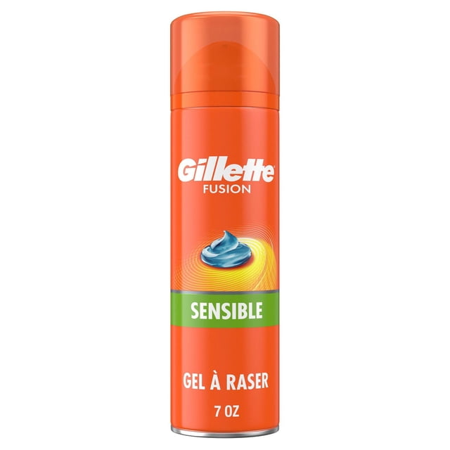 Gillette Fusion Sensitive Skin Shaving Gel for Men in a 7 oz orange can with white Gillette logo and green 'Sensible' label, featuring a blue gel swirl graphic, formulated to reduce shaving irritation and provide a close, comfortable shave for sensitive skin.