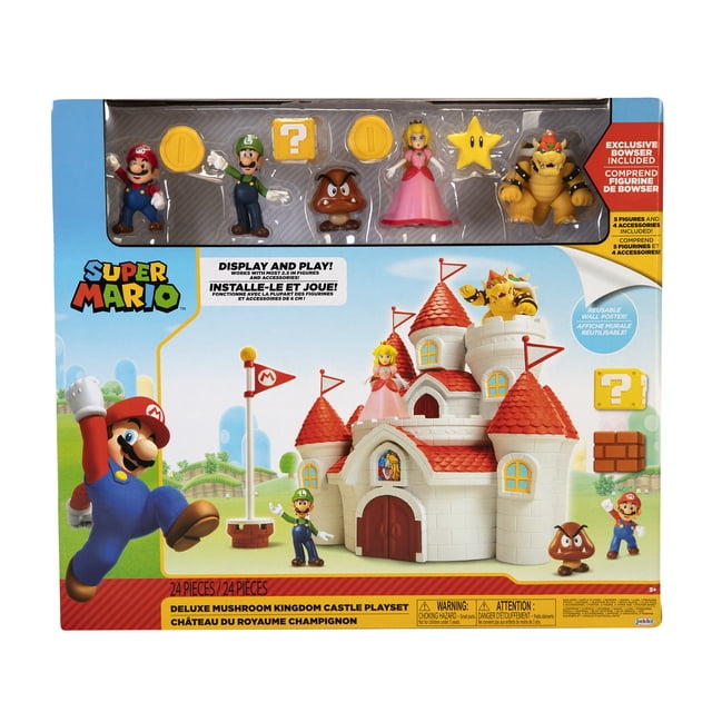 Super Mario Deluxe Mushroom Kingdom Castle Playset featuring a white and red Peach Castle with turrets and flags, including five figures: Mario, Luigi, Princess Peach, Bowser, and Goomba, plus coin and question mark block accessories, suitable for display and imaginative play.