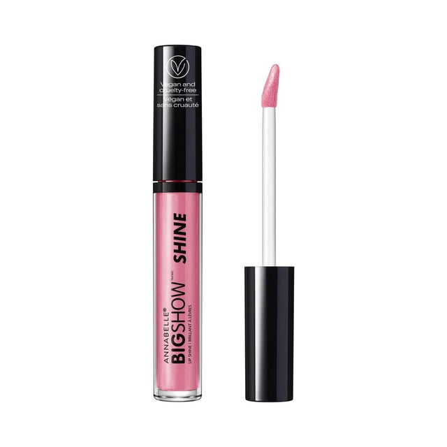 Annabelle Bigshow Lip Shine hydrating lip gloss in a clear tube with black cap, showing shimmery pink gloss with light-reflecting sparkles and a white slanted applicator wand, labeled vegan and cruelty-free.