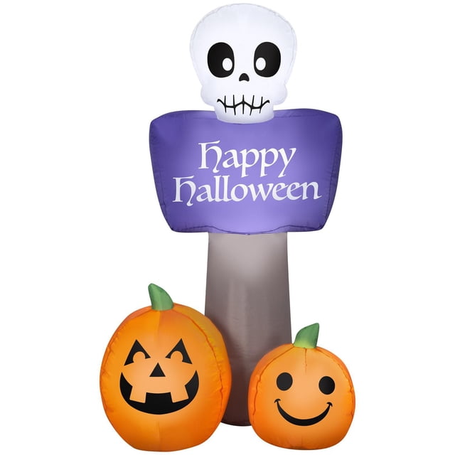 Halloween Inflatable Happy Halloween Sign with a white skull above a purple rectangular panel featuring white 'Happy Halloween' text, supported by a gray inflatable base, and two orange jack-o'-lanterns with green stems at the bottom, ideal for indoor and outdoor Halloween decoration.