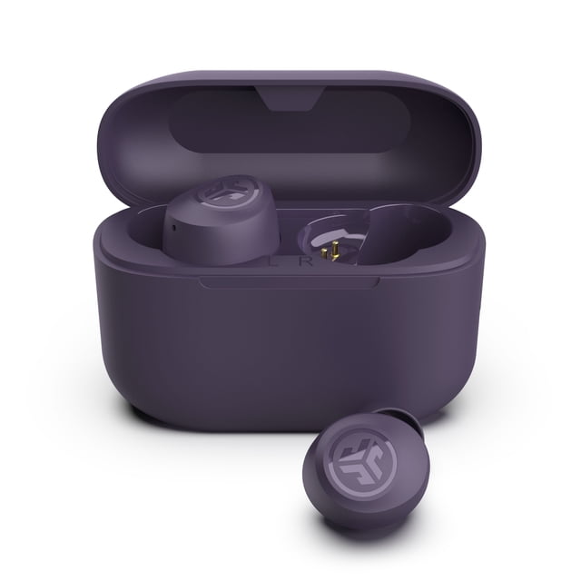 JLab Go Pop+ True Wireless Earbuds in violet, displayed with one earbud outside the compact charging case and another inside. These Bluetooth earbuds offer IPX4 water resistance, Be Aware Mode for ambient sound awareness, and customizable sound profiles via the JLab app. The slim case, smaller than a credit card, includes an integrated USB-C charging cable and provides over 26 additional hours of playtime, complementing the earbuds' 9+ hours of single-charge use. Includes three sets of gel eartips for a secure and comfortable fit.