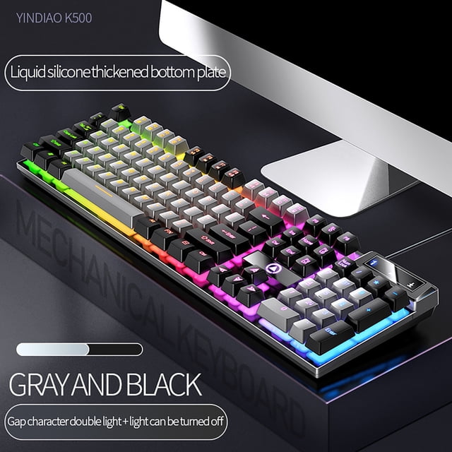 Mefallenssiah Gaming Keyboard USB Wired Floating Keyboard with ergonomic water-resistant mechanical feeling keys. This ultra-slim LED backlit keyboard features customizable RGB lighting effects for enhanced visibility during gaming sessions. Built with durable ABS plastic and a metal base for long-lasting use, it includes anti-ghosting functionality and dedicated media control keys for seamless gaming. Ideal for desktop setups, shown with a modern monitor.