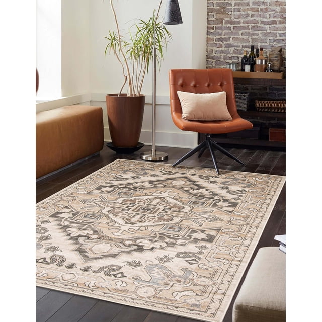 ECARPET Addie Traditional Area Rug for Living Room, Bedroom, Dining Room, Entrance, Hallway and More featuring beige, taupe, and gray geometric medallion and floral patterns, woven in Turkey, displayed on dark hardwood flooring next to a brown leather swivel chair with a beige pillow, a tall potted plant, and a modern floor lamp, ideal for all traffic areas.