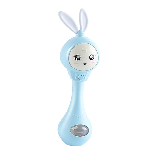 Education Music er Rattle in blue, featuring a smiling face design with soft silicone ears and a transparent ball at the base containing colorful beads. The rattle lights up with colorful and soft lighting and includes six sound options with sand hammer accompaniment. Made from non-toxic ABS material, it measures 23x7x5 cm and is powered by 2 AAA batteries (not included). Suitable for infants aged 0-12 months.