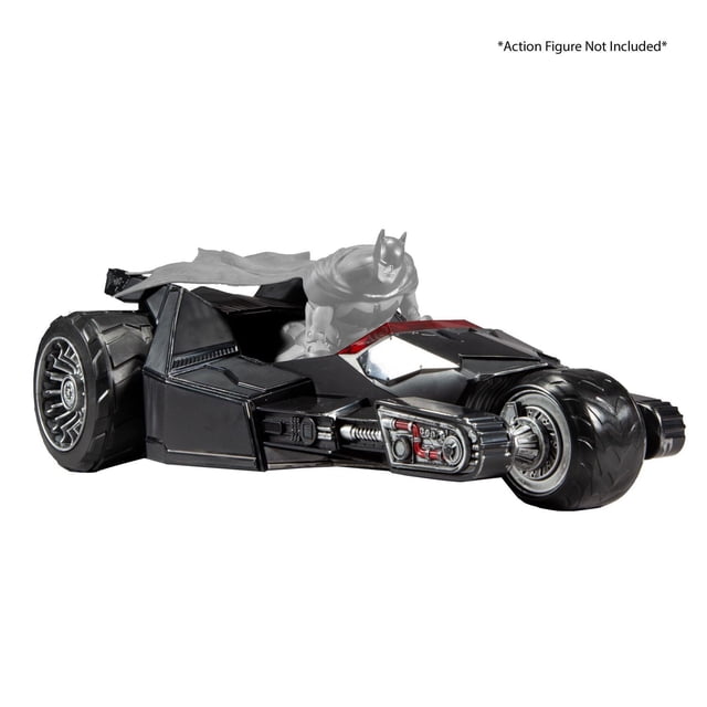McFarlane Toys - DC Multiverse - Bat-Raptor Vehicle, a black three-wheeled open-air roadster with a wide rear tire and telescoping front end extending from 8 to 12 inches, featuring detailed mechanical parts and a red-tinted windshield, designed to fit 7-inch DC Multiverse figures, shown with a grayscale Batman figure crouched behind the cockpit, suitable for action figure vehicle playsets.
