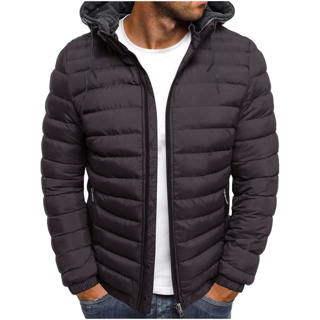 Yuyuzo men's puffer jacket in a dark colour, featuring a lightweight, windproof, and quilted design. The jacket has a zip-up front, elastic cuffs, and two side pockets. It is styled with a hood and shown worn over a white shirt and jeans.