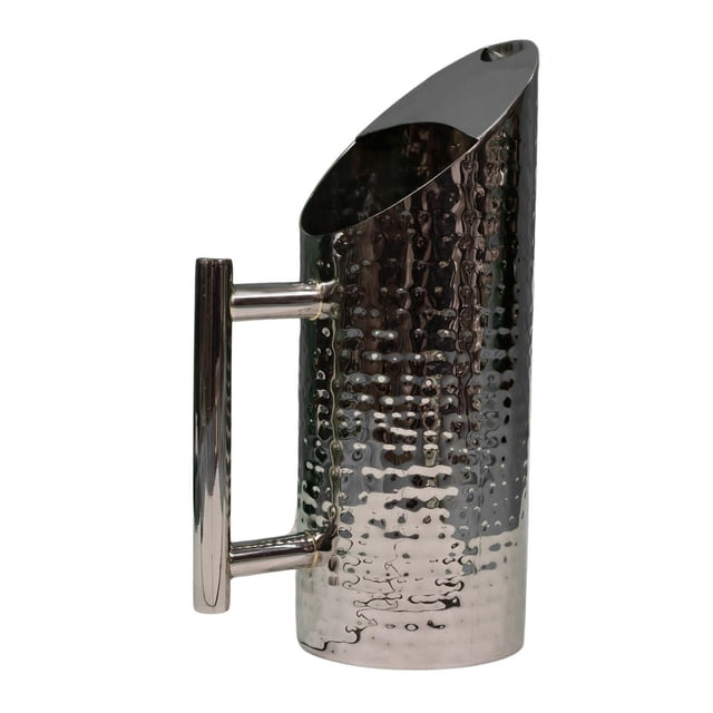 Verka Stainless Steel Hammered Jug with a polished, rust-resistant hammered finish, tall cylindrical body, sturdy horizontal handle, and wide spout for easy pouring, suitable for serving water or juice and easy to clean.