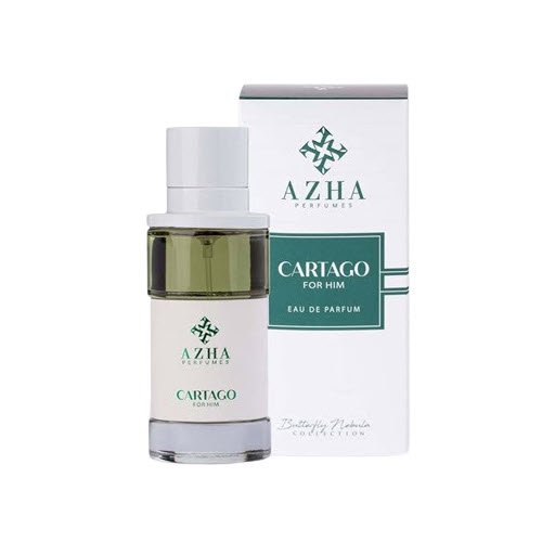 Azha Perfumes Cartago Eau De Parfum Spray For Men 100ml, featuring a sleek cylindrical bottle with a green-tinted glass base and white cap, displayed alongside its matching white and green packaging. This masculine fragrance offers vibrant top notes of pink pepper, red fruits, and rose, a heart of jasmine, orris, and leather, and a warm drydown of amber, musk, and patchouli, ideal for versatile day-to-night wear.