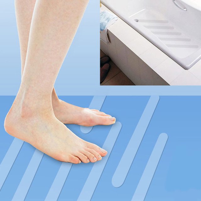 EGNMCR Product For Shower 12pcs Slip Bath Grip Stickers Non Slip Strips shown in use on a blue surface with a close-up of bare feet standing on the adhesive strips. An inset image displays the strips applied inside a white bathtub, enhancing traction and safety. Ideal for baths, showers, stairs, and other slippery surfaces.