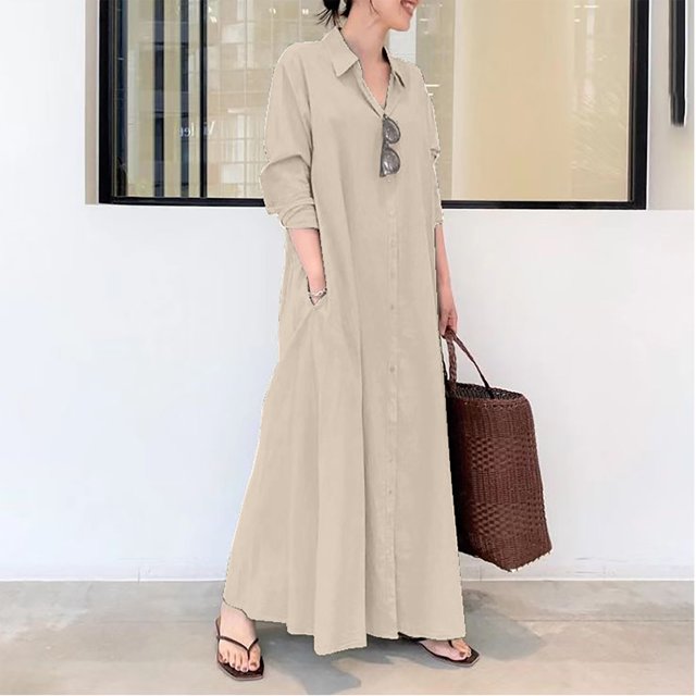 Meichang Robe Chemise Boutonnée pour Femmes Robe Maxi Unie Coupe Ample Manches Longues Col Robes Longues avec Poche Robes Évasées de Travail. l'Image Montre une Robe Maxi beige Pleine Longueur avec devant Boutonné, Manches Longues et Col à Revers. la Robe Présente une Coupe Ample et des Poches Latérales, Style Décontracté avec Tongs et un Sac Fourre-Tout Tissé. Convient aux occasions de Printemps, d'Été et d'Automne.