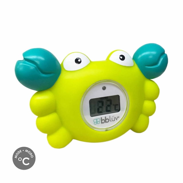 bblüv - Kräb - 3-in-1 Thermometer and Bath Toy (Celsius) shaped like a yellow crab with teal claws and white eyes, featuring a digital display reading 22°C, designed to measure bath water and ambient temperature for baby safety.