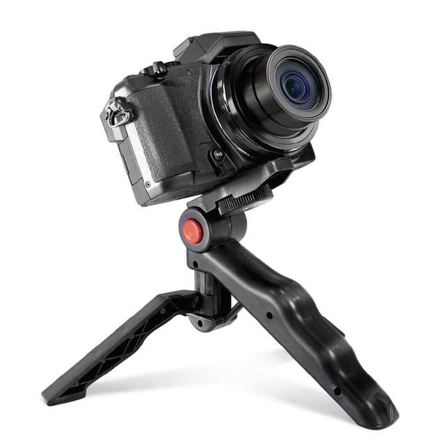 Vivitar Mini Pistol Grip Tripod supporting a black digital camera with extended lens, featuring a compact black pistol grip with a red button and fold-out legs with slip-resistant feet for stable video and photo capture, also suitable for handheld shooting.