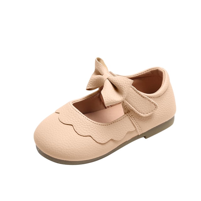 Japceit Baby Shoes Size 4 Soft Sole Baby Shoes in beige artificial leather with a bow detail and scalloped edges. These toddler walking shoes feature a lightweight, flexible design with a non-slip rubber sole, ideal for casual wear, daycare, parties, and outdoor activities. Perfect girls casual shoes for spring.
