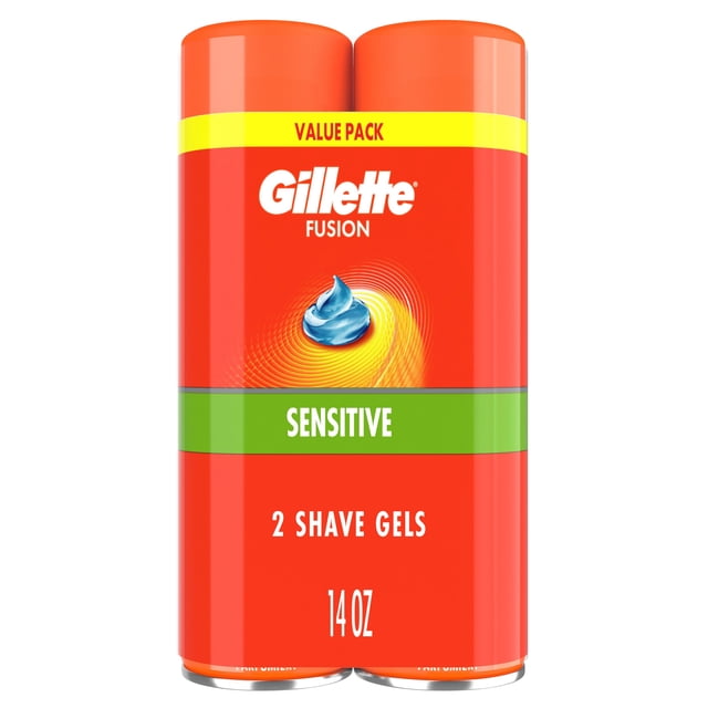 Gillette Fusion Sensitive Skin Shaving Gel for Men value pack with two 14 oz orange cans featuring a green Sensitive label and yellow Value Pack band, designed for a close, comfortable shave on sensitive skin.