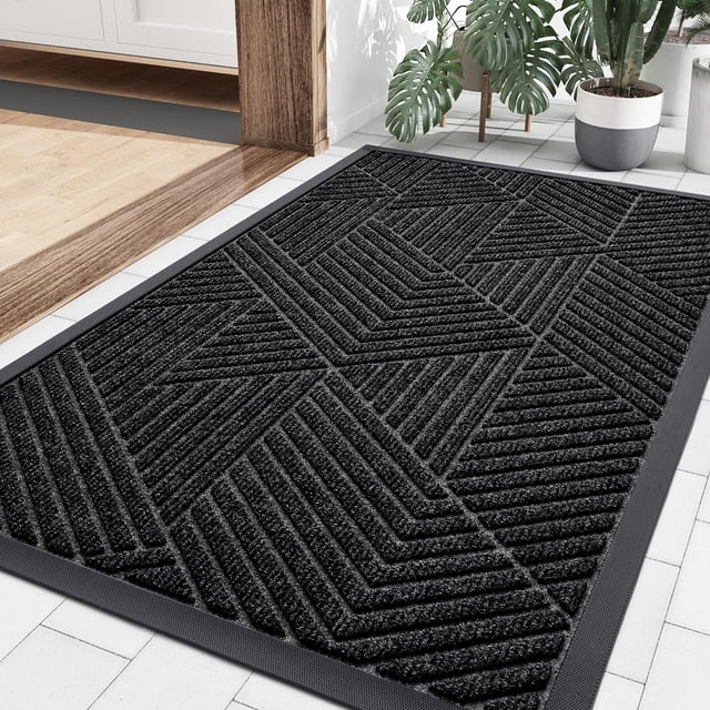 Tapis de Porte avant pour Entrée Extérieure, Tapis en Caoutchouc Naturel Robuste Mesurant 45x75 cm. Ce Paillasson Extérieur Présente une surface en Tissu polyester Tissé avec des Rainures Profondes Conçues pour Capter Efficacement la Saleté, la Boue et les Débris. Ses Bords en Caoutchouc Biseautés Robustes Empêchent l'Accumulation d'Eau, Tandis Que la Doublure en Caoutchouc Antidérapante Assure la Stabilité pendant l'Utilisation. le Profil Bas Convient à la Plupart des Entrées, Permettant aux Portes de s'Ouvrir et de Se Fermer en Douceur Sans Risques de Trébuchement.