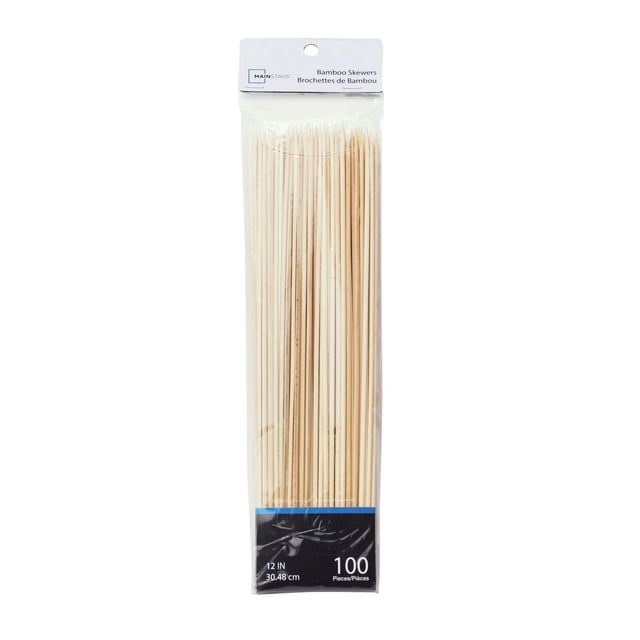 Mainstays™ 12" 100 Piece Bamboo Skewers pack containing natural bamboo skewers neatly aligned in clear plastic packaging with white and black labels indicating 12-inch length and 100 pieces, suitable for BBQ tools and outdoor cooking.