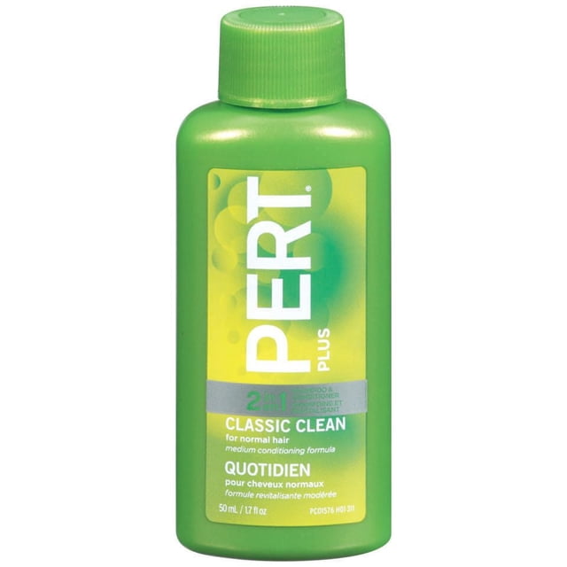 Pert Plus Classic Clean 2 in 1 Shampoo plus Conditioner in a green 50ml bottle with ribbed cap, yellow-green label showing medium conditioning formula for normal hair, gentle on color-treated hair, ideal for daily hair care.