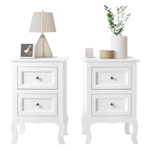 Ktaxon 2pc Nightstand End Table with 2 Drawer Bedside Table, crafted from white wood with a country-style design. Each table features two spacious drawers with round metal knobs for bedside storage. Compact and sturdy, ideal as accent furniture for bedrooms or offices. Displayed with decorative items like a lamp and plant on top.