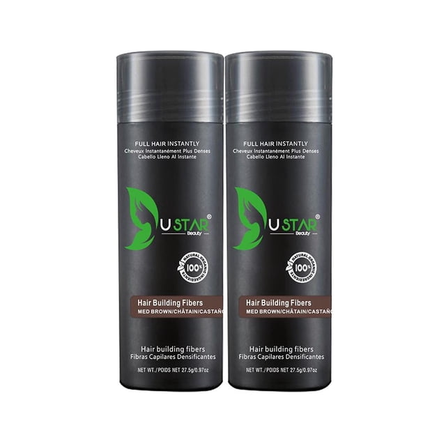 2 Pack - Ustar Hair Building Fiber Medium Brown 0.97 oz/27.5 g. Two black cylindrical containers with green Ustar Beauty branding and text indicating 'Hair Building Fibers' in medium brown. These keratin-based fibers blend with existing hair to conceal thinning areas and create a fuller appearance. Resistant to wind, rain, and perspiration, suitable for all hair types, and easily washable with shampoo.