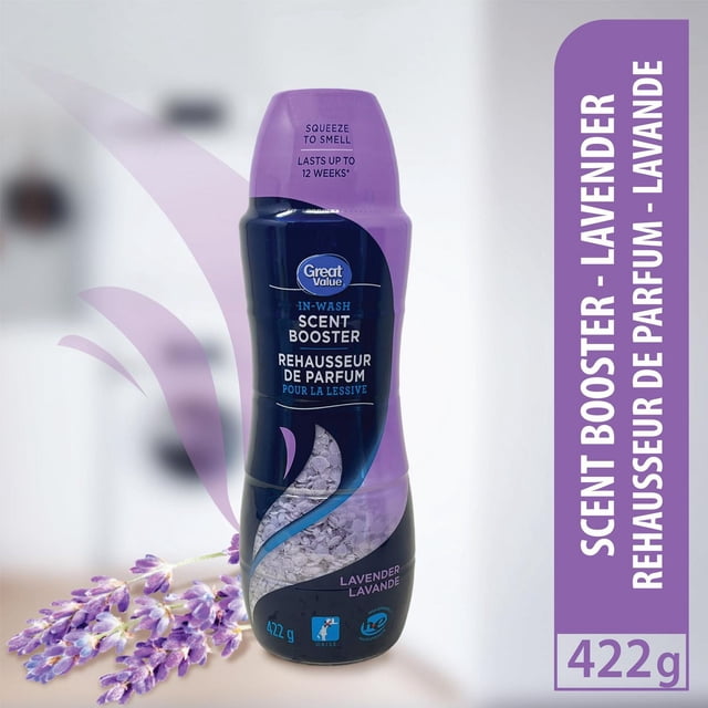 Great Value In-Wash Lavender Scent Booster 422 g bottle with purple cap and black body, featuring visible lavender scent crystals through a clear window, suitable for regular and HE laundry machines, shown with lavender flowers and scent wave graphics.
