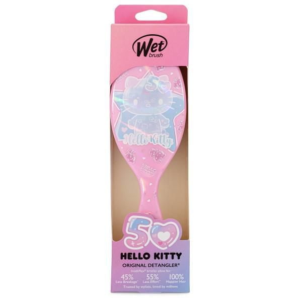 Wet Brush - Hello Kitty 50th Anniversary Edition pink detangling hairbrush featuring Hello Kitty design and ultra-soft IntelliFlex bristles that reduce breakage and pain, packaged to highlight gentle detangling for all hair types.