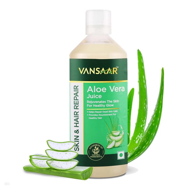 Vansaar Aloe Vera Juice for glowing skin and healthy hair, 100% natural and cold-pressed with pulp, 1L (2.2lbs) bottle. The product is displayed with a green label highlighting its benefits for skin and hair repair. Aloe vera leaves and slices are placed beside the bottle, emphasizing its natural ingredients.