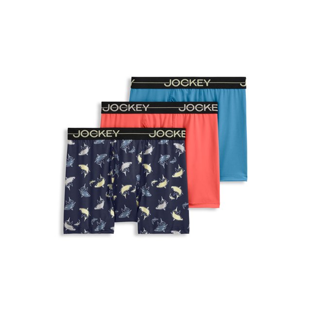 Jockey Boys' Microfiber Stretch Boxer Brief - 3 Pack designed for boys' active days, featuring mid-rise, full coverage, and Staycool+ moisture-wicking technology. Includes one navy pair with shark print, one solid coral pair, and one solid blue pair, all made with stretchy, soft fabric and flatlock seams for comfort.