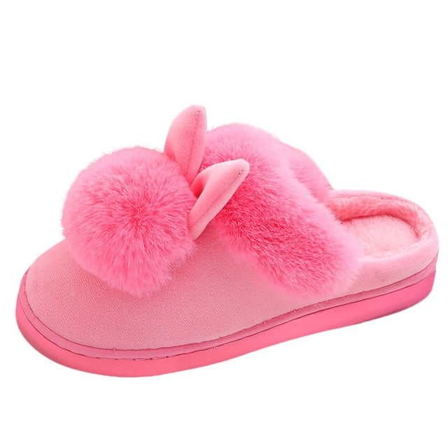 Kcodviy Pantoufles d'Intérieur d'Hiver pour Femmes à Bride Arrière, Présentant un design Rose Duveteux avec des Oreilles de Lapin et des accents Pompon. Ces Pantoufles Souples Ont une Semelle en Caoutchouc, un Talon Plat et un Bout Rond, les Rendant Adaptées à l'Usage Intérieur pendant les Saisons Plus Froides. le style à Enfiler Assure un Enfilage Facile, et la Semelle Intérieure Est Conçue pour le Confort. Idéal pour les Contextes Décontractés et de Loisirs.